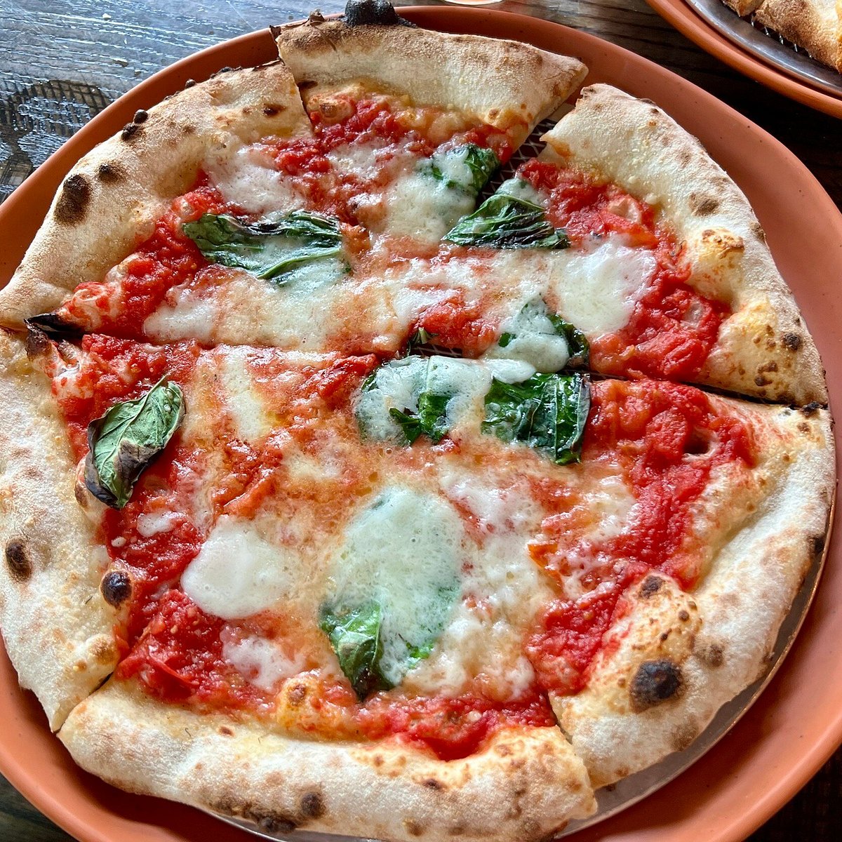 Dough Pizzeria signature dishes Margherita PizzaProsciutto Crudo e Rucola PizzaHouse-made Burrata